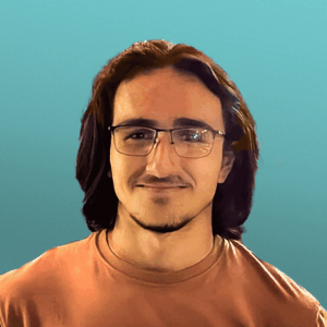 Portrait of Colby Carrizales smiling.